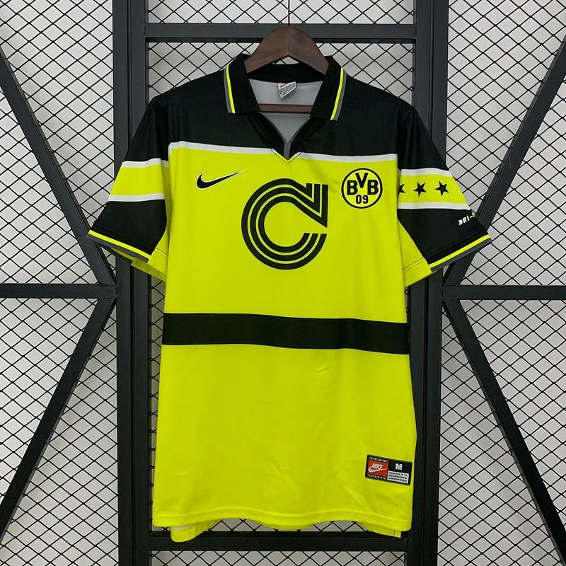 Borussia Dortmund retro short-sleeve jersey, front view with neon yellow body, dark shoulders and sleeves, fold-over collar and BVB 09 crest.
