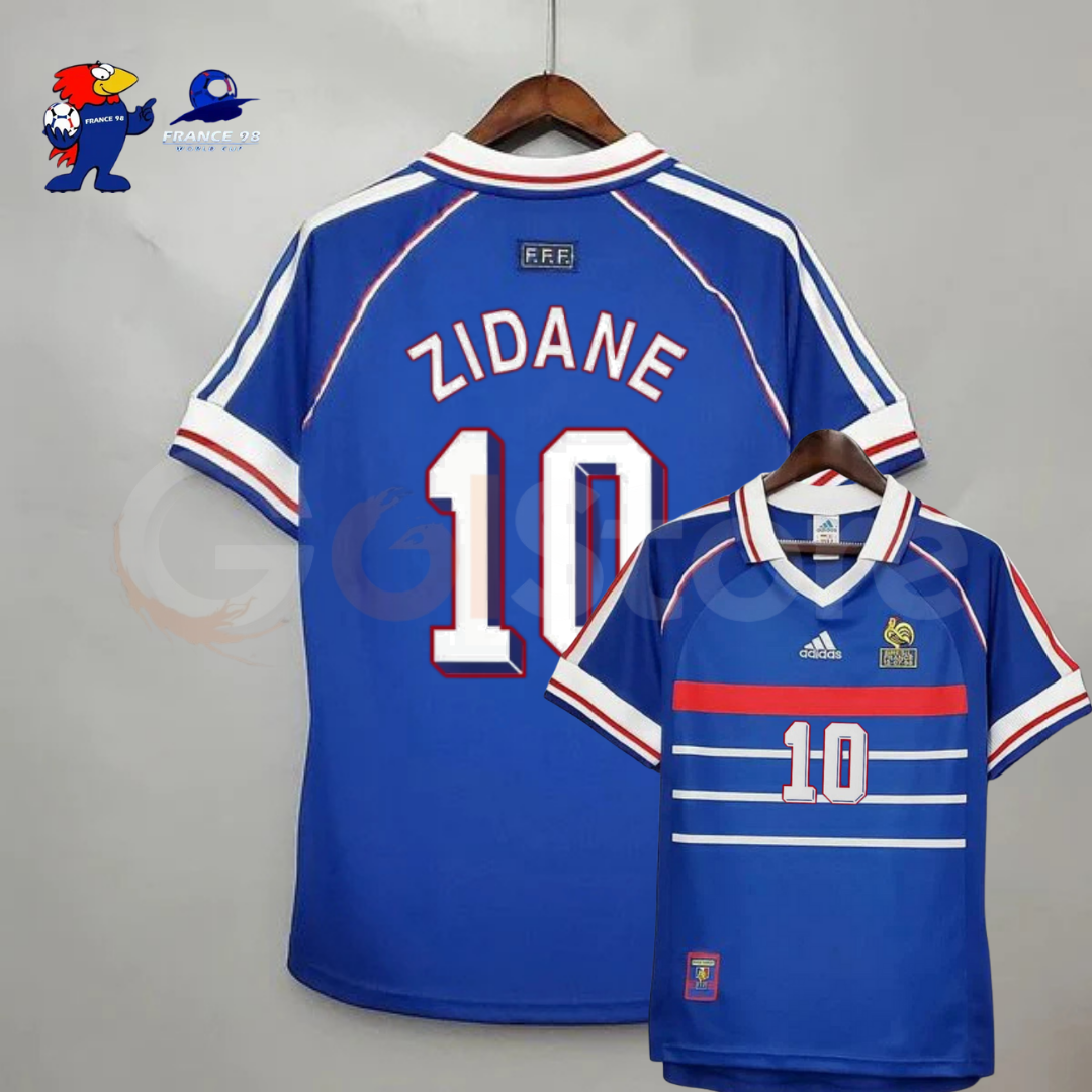 France blue short-sleeve retro home jersey, front and back views with Zidane 10 print, red and white chest stripes and a white fold-over collar.
