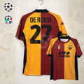 Front and back views of a burgundy and gold AS Roma short-sleeve retro jersey with black De Rossi number 27 print and INA Assitalia sponsor, alongside UCL and Serie A badge graphics.