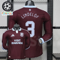 Front and back views of a claret Aston Villa long-sleeve jersey with a light blue collar, light blue Lindelöf number 3 print and Visit Rwanda sponsor.