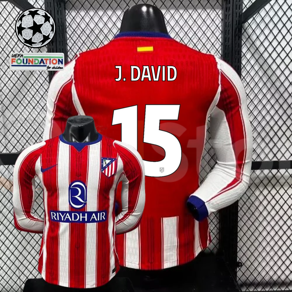 Front and back views of a red and white Atlético Madrid long-sleeve jersey with blue trim, white J. David number 15 print and Riyadh Air sponsor, alongside UCL graphics.