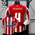 Front and back views of a red and white Atlético Madrid long-sleeve jersey with blue trim, white Mendoza number 4 print and Riyadh Air sponsor, alongside UCL graphics.