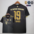 Bayern Munich 2021–2022 black and gold short-sleeve away jersey, showing front and back views with Davies #19 lettering and UCL patch graphics.