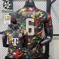Front and back views of a black Bayern Munich short-sleeve jersey with a multicolored abstract design, cream Kimmich number 6 print and Telekom sponsor, alongside UCL and Bundesliga graphics.