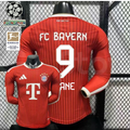  Front and back views of a red Bayern Munich long-sleeve home jersey with tonal stripes, white Kane number 9 print and Telekom sponsor, alongside UCL and Bundesliga badge graphics.