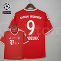 Front and back views of a red Bayern Munich short-sleeve jersey with white trim, “Final Wembley 2013” chest lettering and Mandžukić 9 printing on the back.