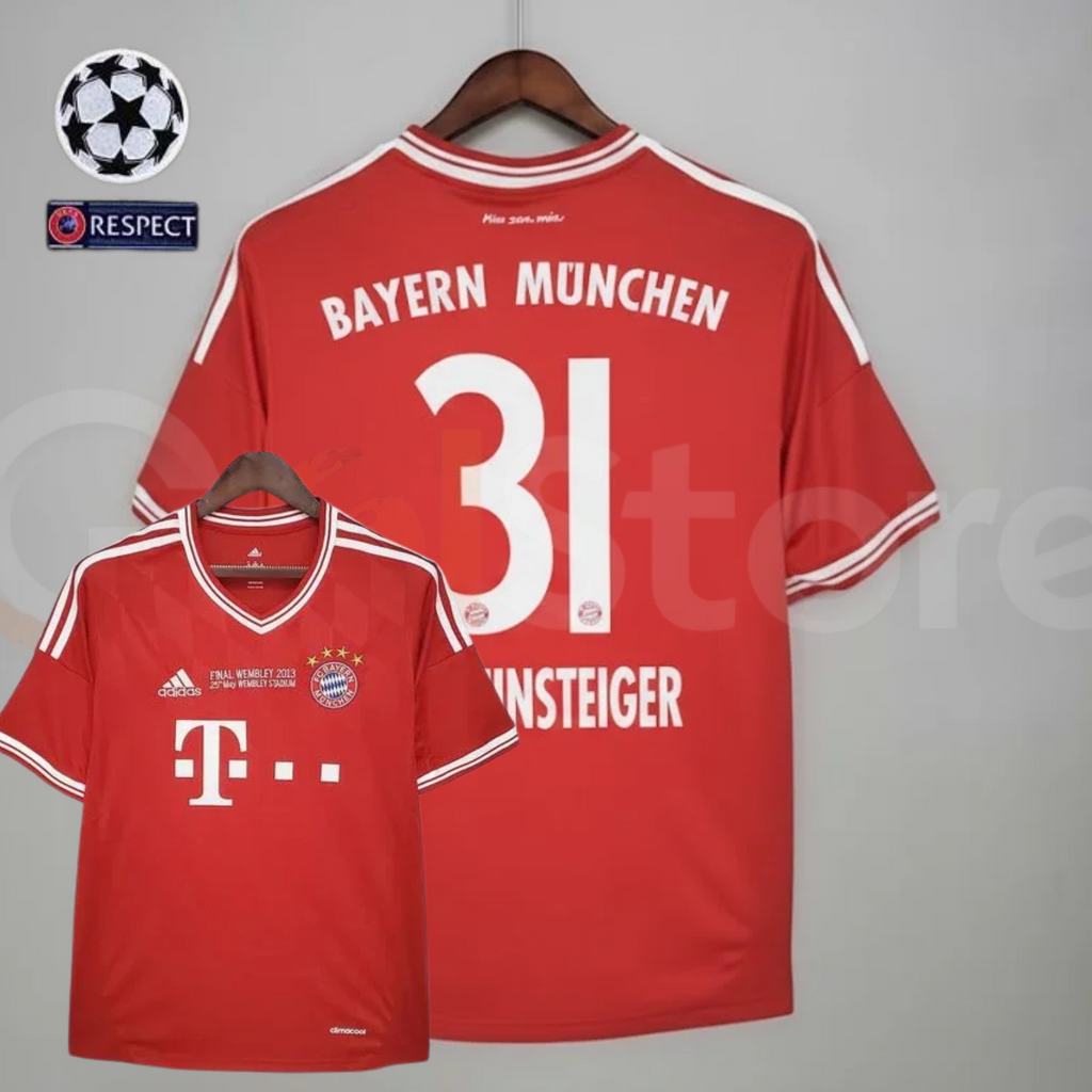 Front and back views of a red Bayern Munich short-sleeve jersey with white trim, “Final Wembley 2013” chest lettering and Schweinsteiger 31 printing on the back.