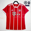 Front view of a red Bayern Munich retro short-sleeve home jersey with thin white vertical stripes, white collar and sleeve trim, and club crest.