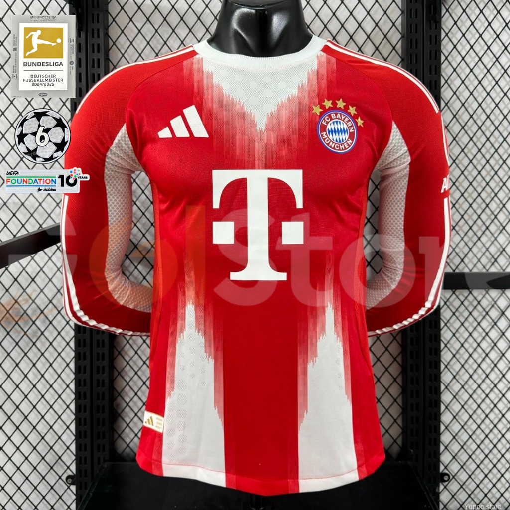 Front view of a red and white Bayern Munich 2025–2026 long-sleeve home jersey with white shoulder stripes, club crest and white sponsor logo.