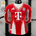 Front view of a red and white Bayern Munich 2025–2026 long-sleeve home jersey with white shoulder stripes, club crest and white sponsor logo.