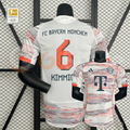 Front and back views of a white Bayern Munich short-sleeve jersey with red and grey patterns, orange trim, and Kimmich 6 printing on the back.