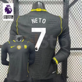 Chelsea dark grey long-sleeve jersey shown from the front and back, with white NETO 7 print, neon yellow details and a gold FIFA World Champions chest badge.
