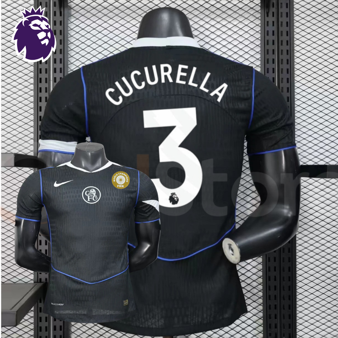 Front and back views of a black Chelsea FC short-sleeve third jersey with blue piping, white Cucurella number 3 print and a gold FIFA World Champions chest badge.