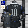 Front and back views of a black Chelsea FC short-sleeve third jersey with blue piping, Palmer number 10 print and a gold FIFA World Champions chest badge.