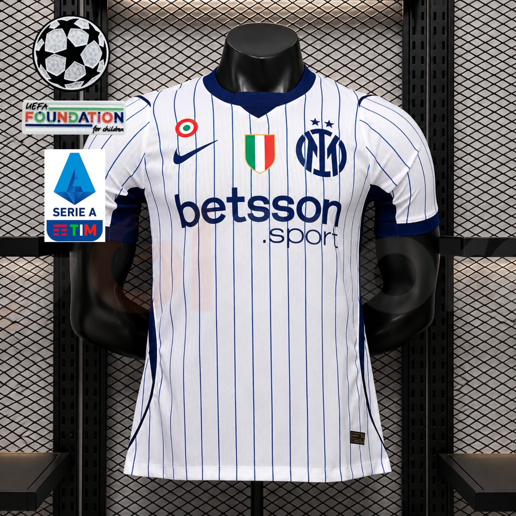 Front view of a white Inter Milan short-sleeve jersey with thin blue pinstripes, blue collar and cuffs, club crest and Betsson Sport sponsor, alongside UCL and Serie A graphics.