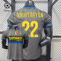  Front and back views of a grey Inter Milan short-sleeve third jersey with blue trim, yellow Mkhitaryan number 22 print and Betsson Sport sponsor.