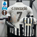 Juventus black and white short-sleeve jersey, front and back views with F. CONCEIÇÃO 7 print, white polo collar and gold Jeep detailing.
