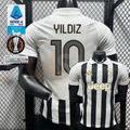 Juventus black and white short-sleeve jersey, front and back views with YILDIZ 10 print, white polo collar and gold Jeep detailing.
