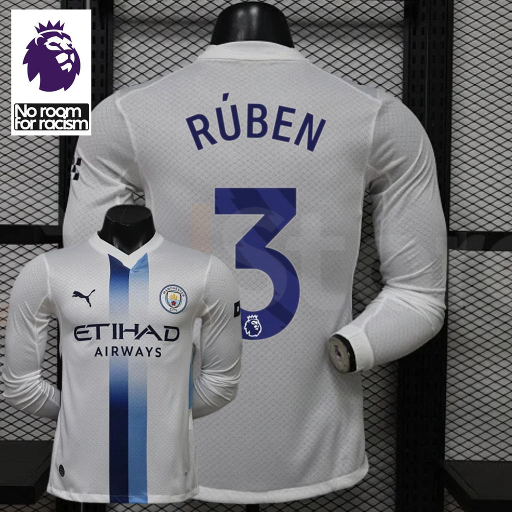 Front and back views of a white Manchester City long-sleeve jersey with blue central stripes and Rúben number 3 print, alongside a Premier League graphic.
