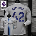 Front and back views of a white Manchester City long-sleeve jersey with blue central stripes and Semenyo number 42 print, alongside a Premier League graphic.