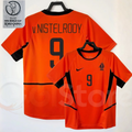Netherlands orange short-sleeve retro jersey, front and back views with V. NISTELROOY 9 print, black collar and side panels, alongside a 2002 World Cup graphic.
