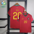 Portugal 2006 retro red short-sleeve home jersey, front and back views with gold Deco #20 lettering, green collar and sleeve trim, national team crest and World Cup sleeve patches.
