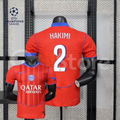 Front and back views of a red PSG short-sleeve jersey with blue trim, white Hakimi number 2 print and Qatar Airways sponsor, alongside a UEFA Champions League graphic.