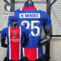 Front and back views of a blue PSG short-sleeve jersey with a red and white central stripe, N. Mendes lettering and white number 25, alongside trophy and UEFA Foundation graphics.