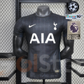 Front view of a black Tottenham Hotspur short-sleeve jersey with a subtle grid pattern, white club crest and white AIA sponsor.