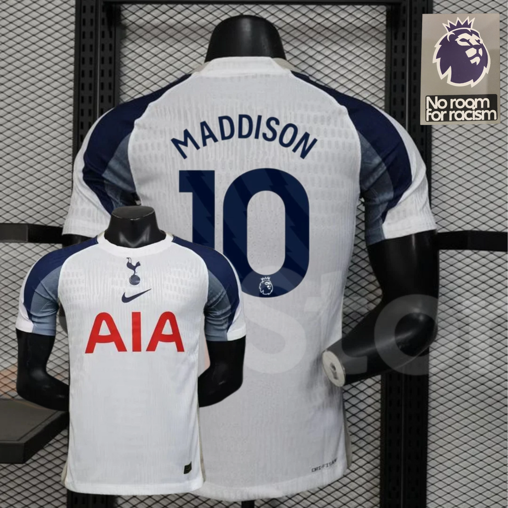 Front and back views of a white Tottenham Hotspur short-sleeve home jersey with navy and grey sleeves, navy Maddison number 10 print and red AIA sponsor.